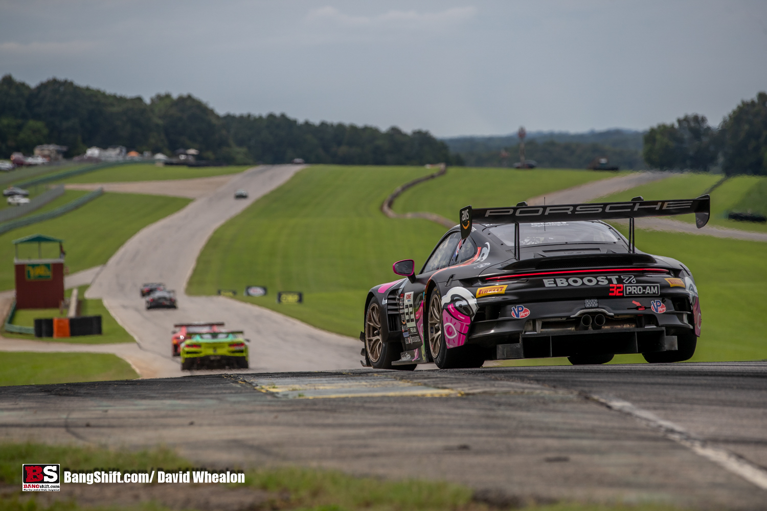 Thrilling Action Shots from the GT World Challenge America at Virginia International Raceway: Road Racing Highlights Amidst Nature!