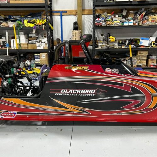 Rewrite this title better PROJECT 1675: BUILDING AN AFFORDABLE – BUT FAST – TOP DRAGSTER COMBINATION – PART 1